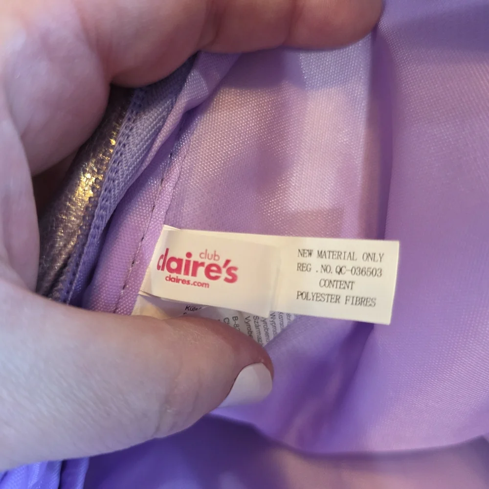 Claire’s Iridescent Unicorn Mini Backpack – Glitter Pastel Purple Bag